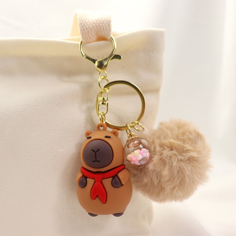 Porte clés capybara pompon